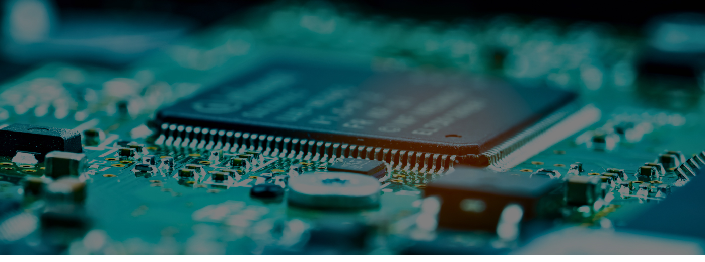 Close-up view of a computer chip showcasing intricate circuits and connections on its surface