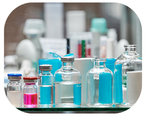 A shelf displaying a variety of vials and bottles in different shapes and sizes, showcasing their contents